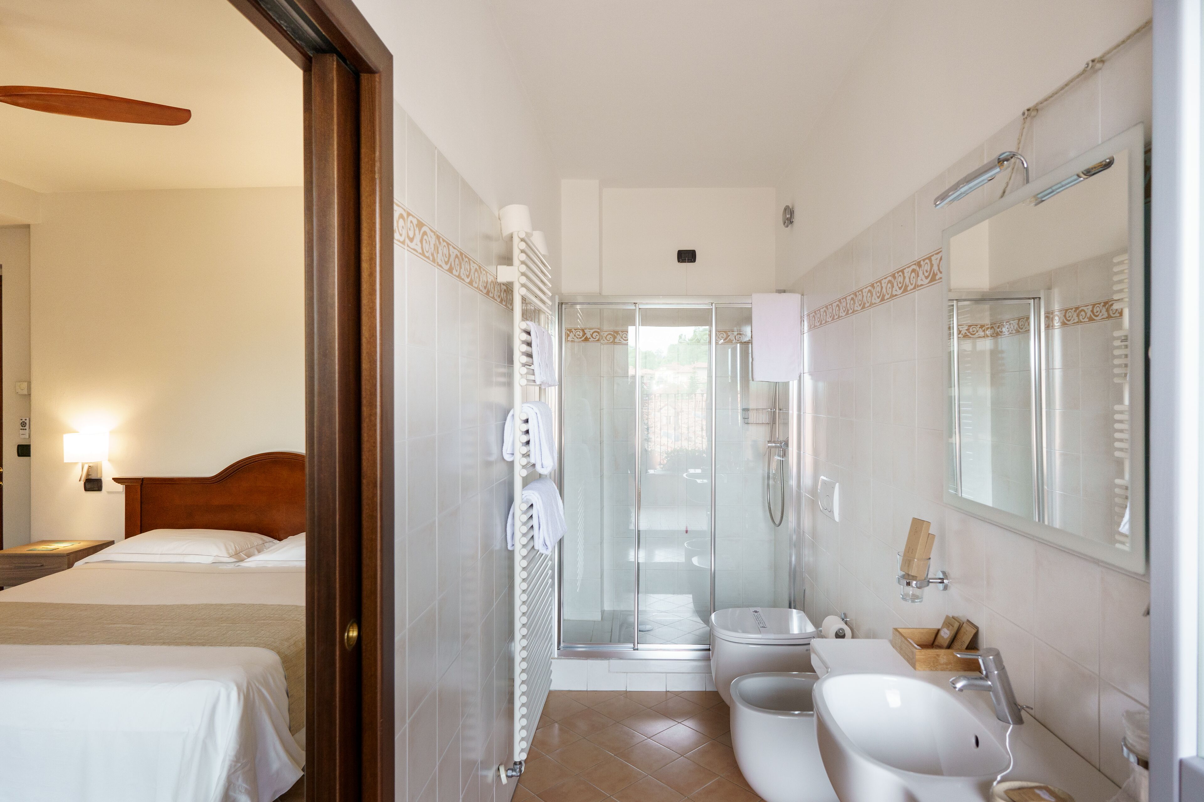 standard room | bathroom | shower, free toiletries, hair dryer, towels