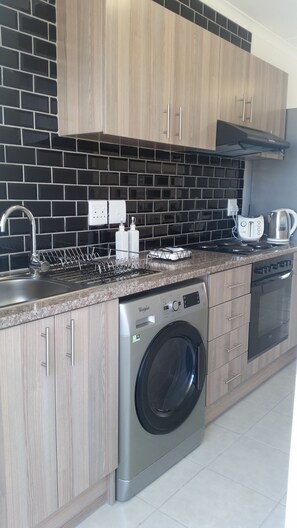 Apartment, 2 Bedrooms | Private kitchen - Coral Sands on Muizenberg (Cape Town)