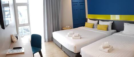 Superior Triple Room | In-room safe, desk, laptop workspace, blackout curtains