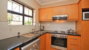 Apartment, 2 Bedrooms (Vilaroux 3) | Private kitchen | Full-sized fridge, microwave, oven, stovetop