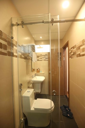 Shower, free toiletries, hair dryer, slippers