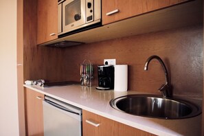 Apartment, 1 Bedroom | Private kitchen | Fridge, microwave, oven, stovetop