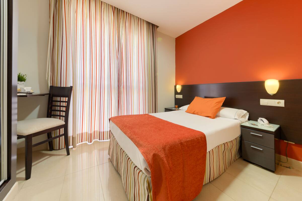 In-room safe, desk, blackout curtains, free cots/infant beds