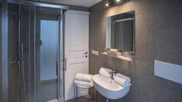 Shower, free toiletries, hair dryer, bathrobes