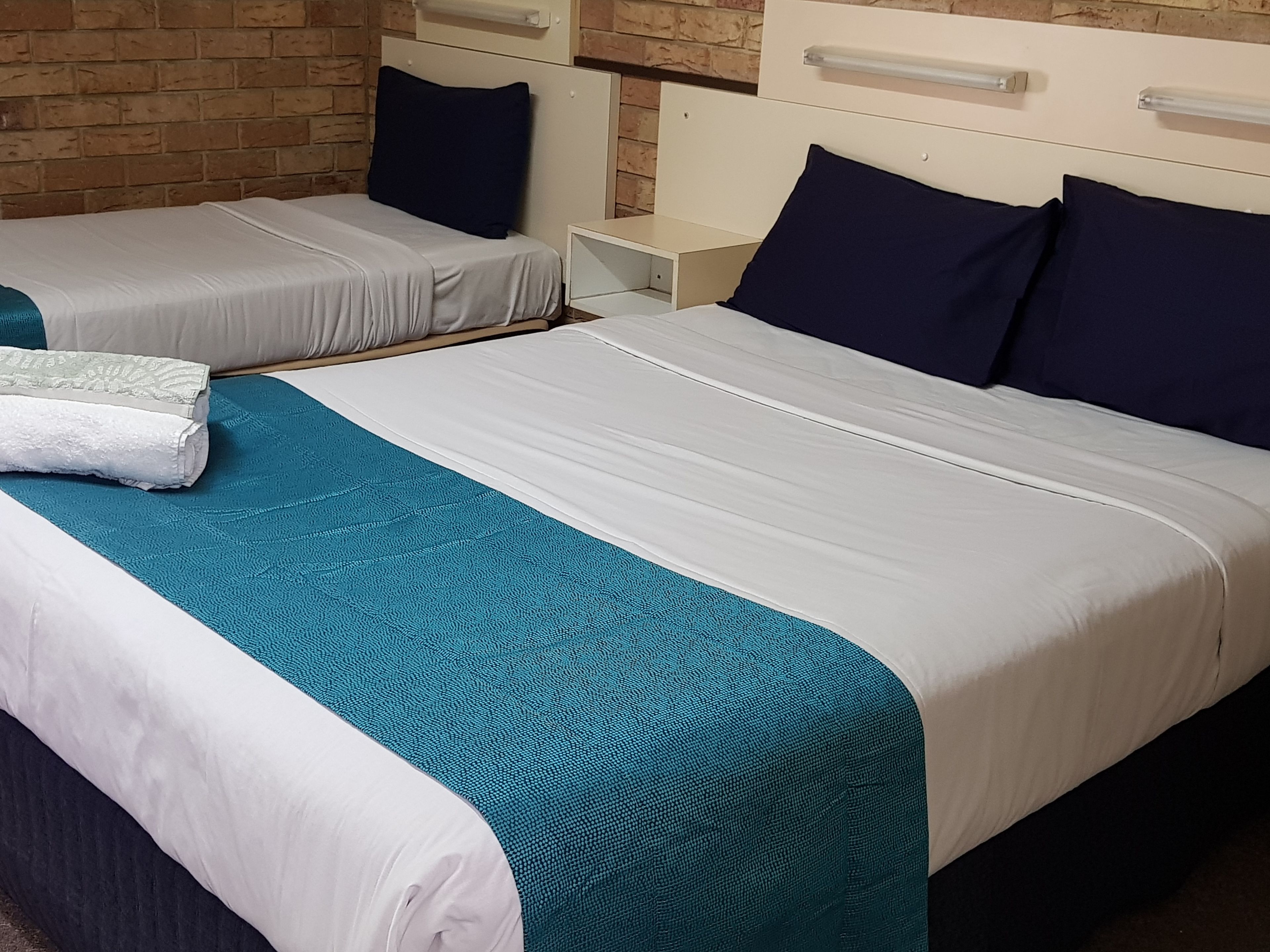 Economy Triple Room | Iron/ironing board, free WiFi, bed sheets