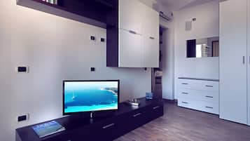 Quarto casal, sacada, vista para o mar | Comodidades do quarto