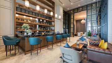 3 bars/lounges, rooftop bar
