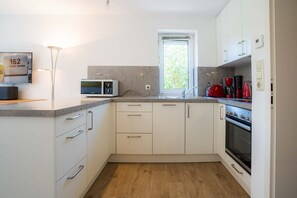 Fridge, microwave, oven, dishwasher