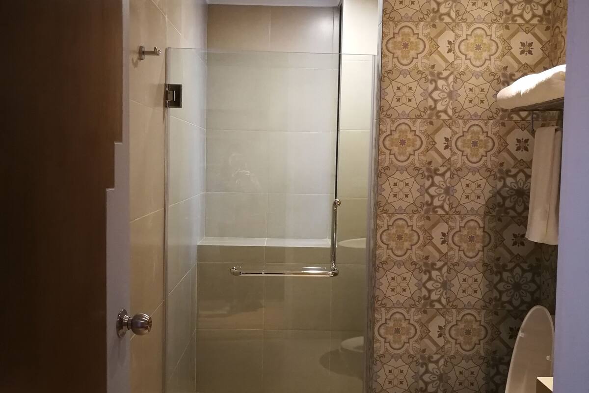 shower, free toiletries, hair dryer, bathrobes