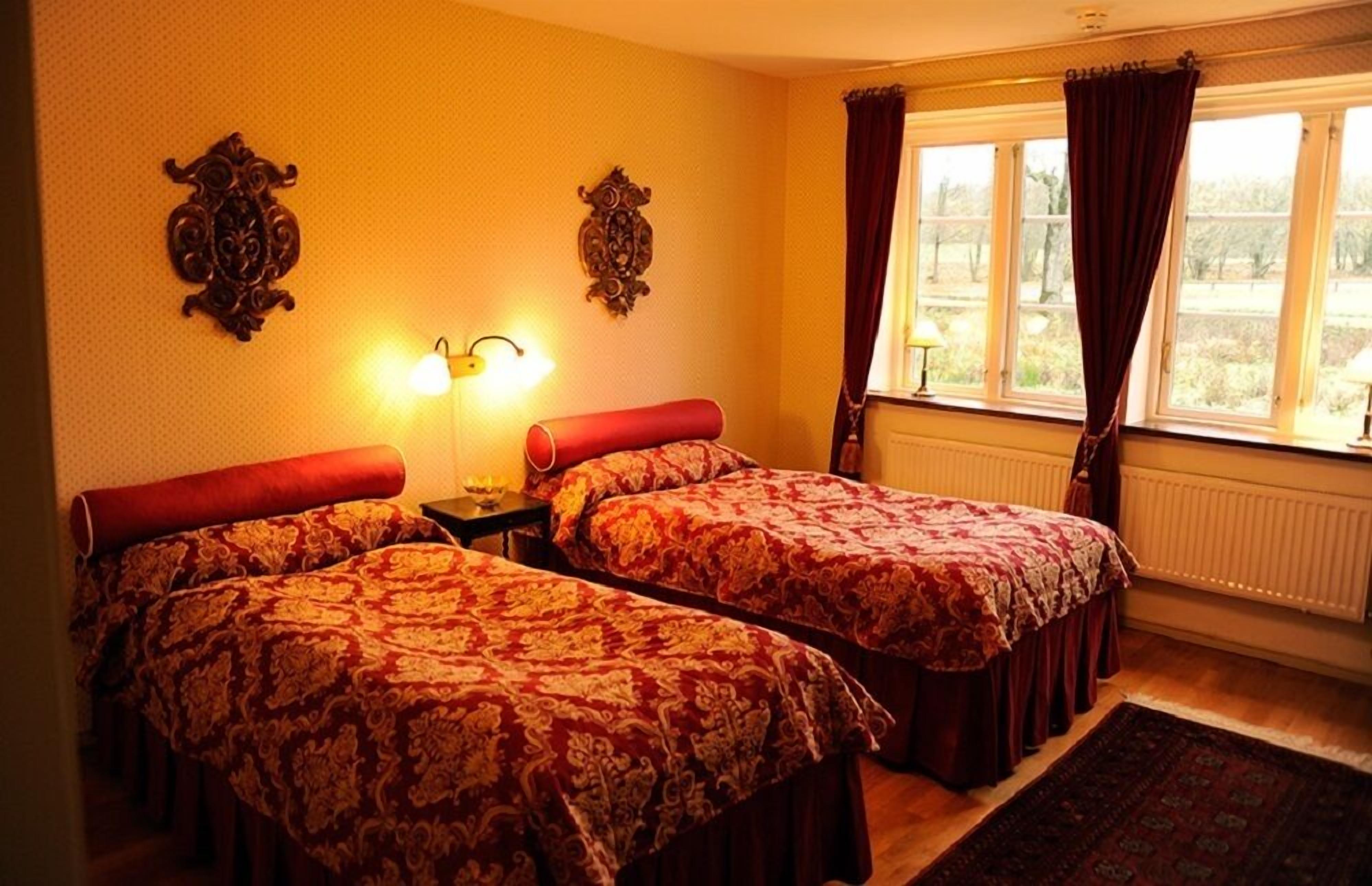 Blackout curtains, iron/ironing board, rollaway beds, free WiFi