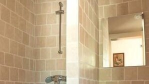 A bathroom with a shower, a toilet, and a sink. - House with pool and river access (Fontaine-de-Vaucluse)
