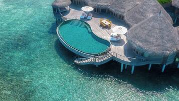 Outdoor pool, free cabanas, pool umbrellas