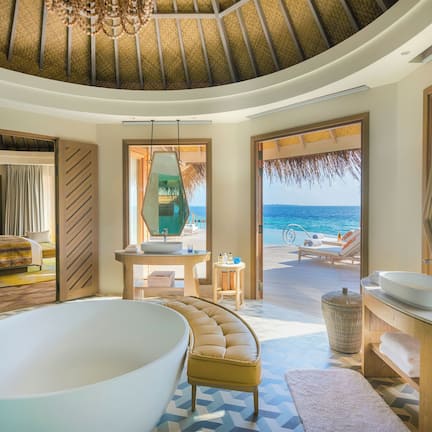 The Nautilus Retreat | Bathroom | Separate tub and shower, deep soaking tub, hydromassage showerhead