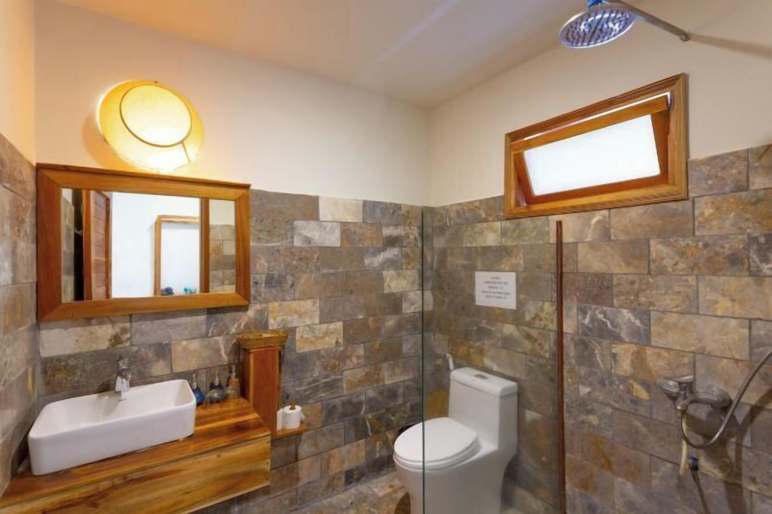 Bathroom | Shower, free toiletries, hair dryer, bathrobes