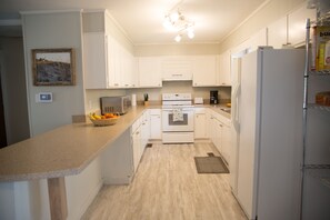 Microwave, coffee/tea maker, cookware/dishes/utensils