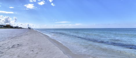 On the beach, sun-loungers, beach towels