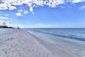 On the beach, sun loungers, beach towels