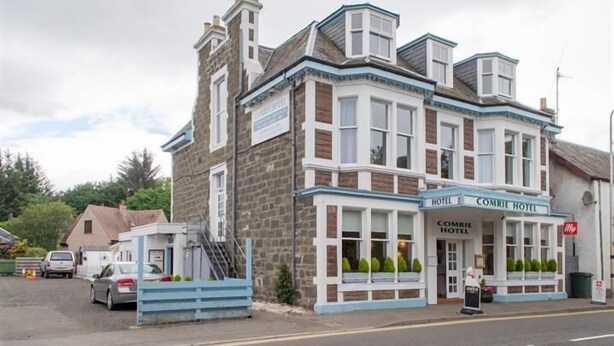 A two-story building with a sign reading "Comrie Hotel" on the front. - Comrie Hotel (Crieff)