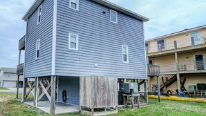 A two-story building with a flat roof and a covered outdoor area. - Hoff 1 | Walk to the Beach + Sound, Pet Friendly! (Topsail Beach)