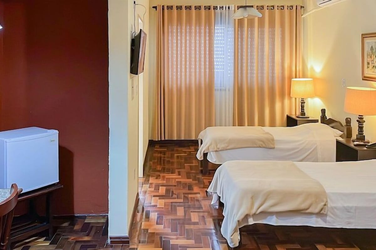 Cortinas blackout, wifi gratis y ropa de cama 