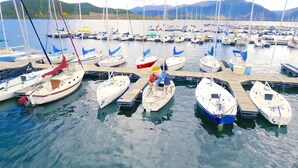 A marina with multiple boats docked at wooden piers. - 3-bedroom condo in downtown Frisco - Near Lake Dillon.  (Frisco)
