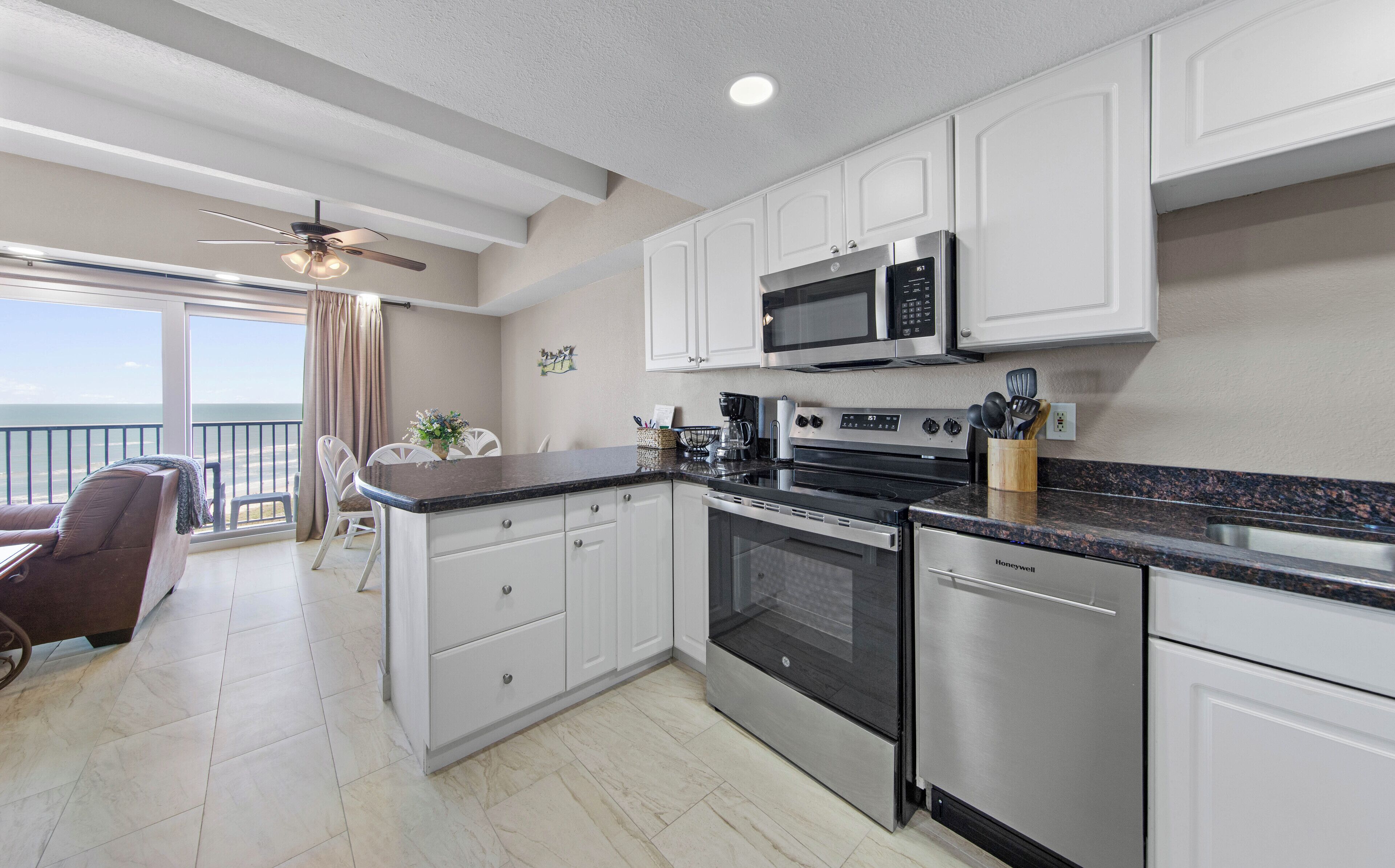 Coffee/tea maker, fridge, microwave, oven