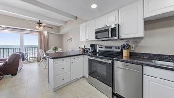 Coffee/tea maker, fridge, microwave, oven
