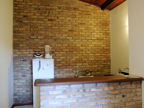 Family Townhome, 1 Bedroom | Private kitchenette | Fridge, microwave, oven, stovetop - Nossa Casa em Jeri (Jijoca de Jericoacoara)