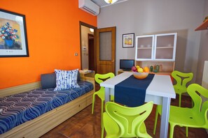 Comfort Apartment, 1 Bedroom | Living area | TV, ping pong, books