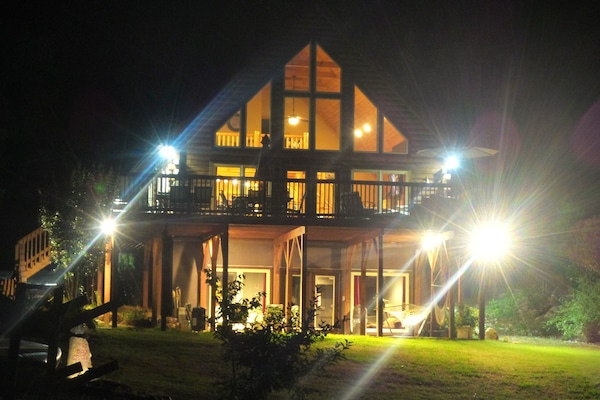 Lake house at night