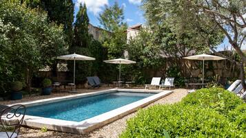 Outdoor pool, pool umbrellas, pool loungers