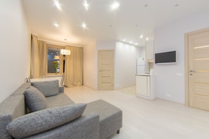 Studio Suite, 1 Queen Bed with Sofa bed, Tower | Living area | Flat-screen TV - TravelFlat Apartments (Krasnogorsk)