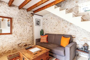 Habitación | Zona de estar | Una televisión de pantalla plana