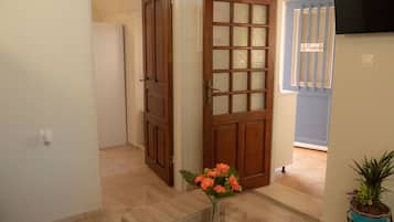 Double Room, 2 Bedrooms, City View | Living area | Flat-screen TV, Netflix