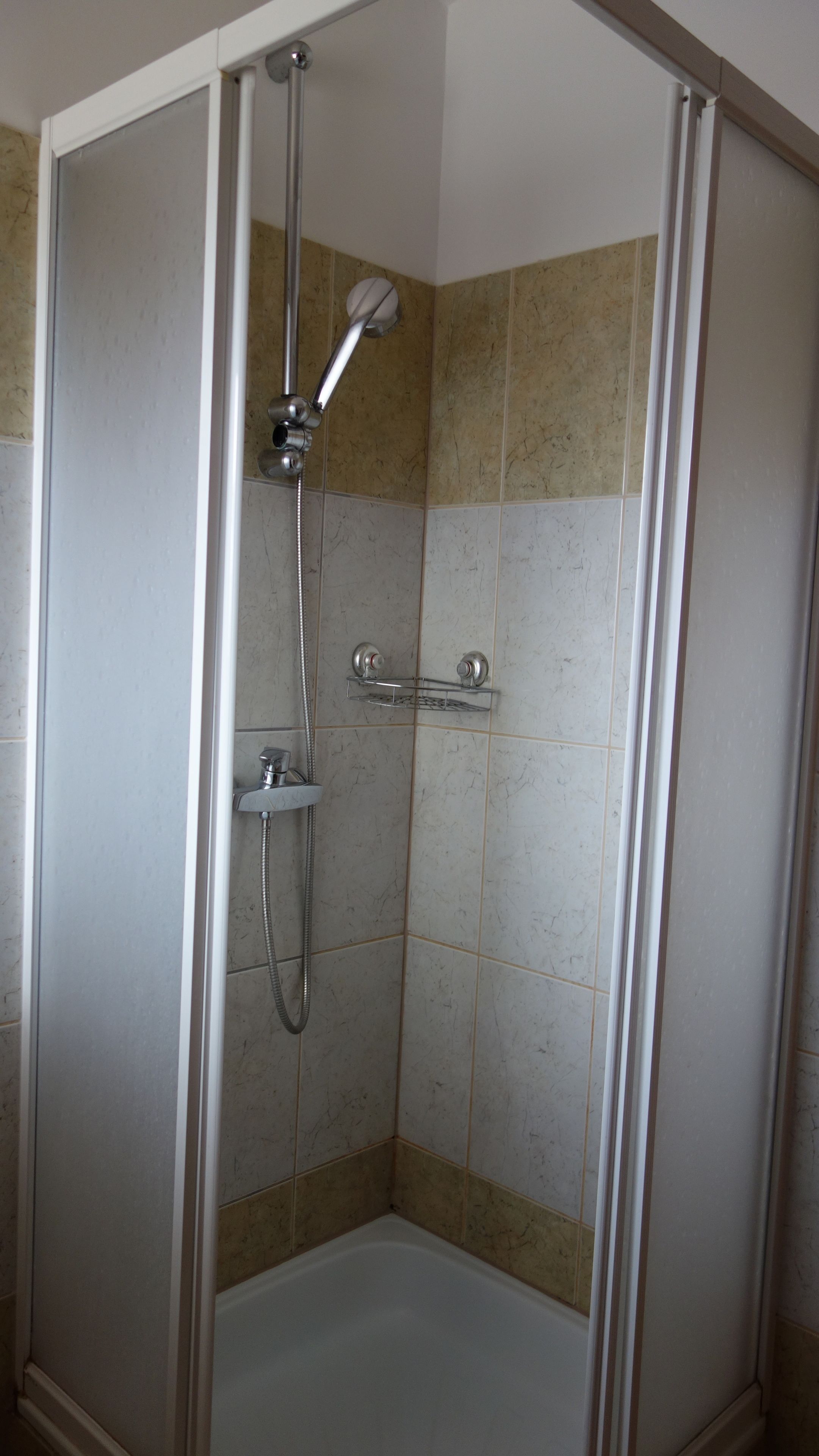 Shower, towels, soap, toilet paper