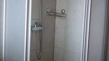 Shower, towels, soap, toilet paper