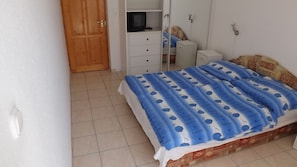 Apartamento de diseño, lanai | 1 dormitorio, wifi gratis, ropa de cama