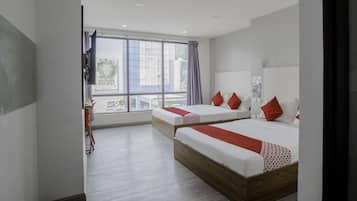 Deluxe Suite, Multiple Beds | 1 bedroom, desk, free WiFi, bed sheets
