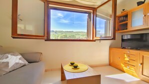 TV - VACAY Apartamento Tras (LA ESCALA)