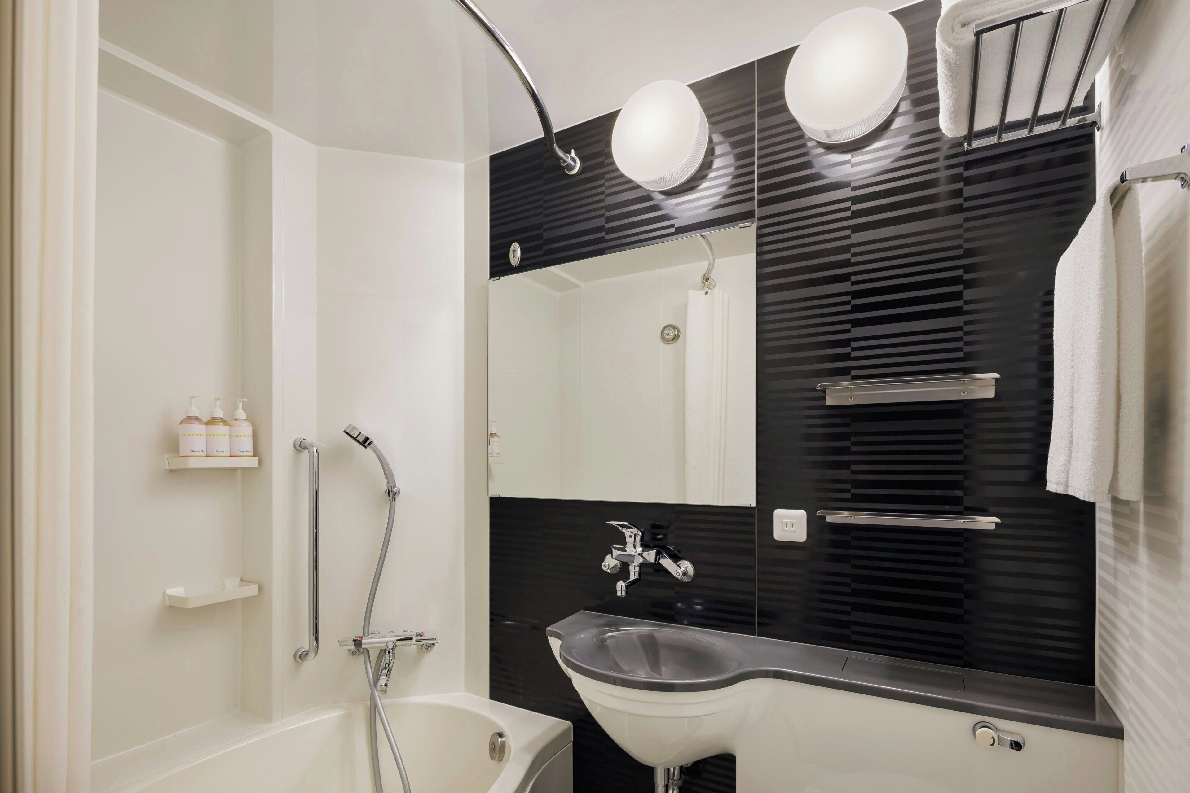 combined shower/bathtub, deep-soaking bathtub, free toiletries