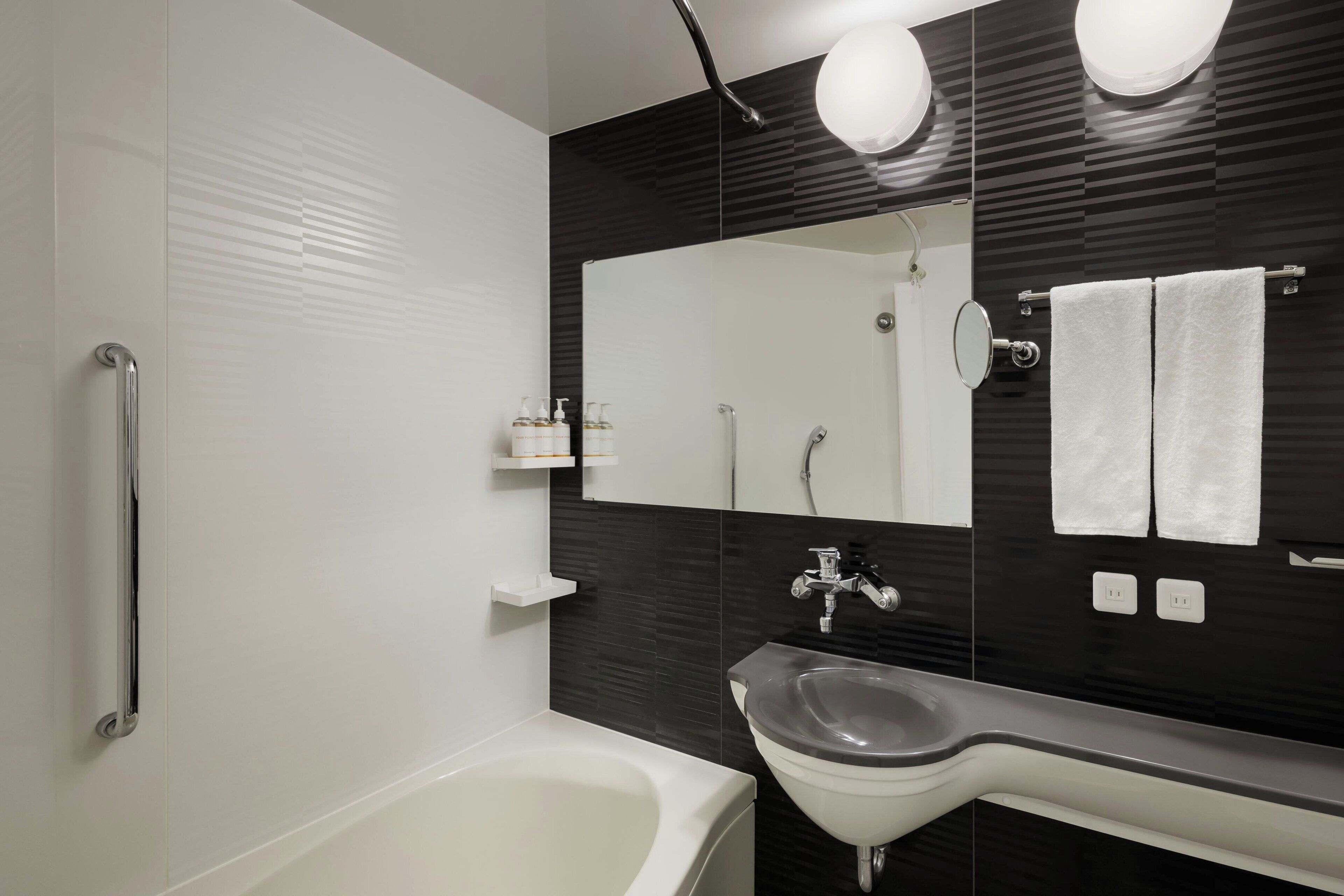 room, 2 single beds | bathroom | combined shower/bathtub, deep-soaking bathtub, free toiletries
