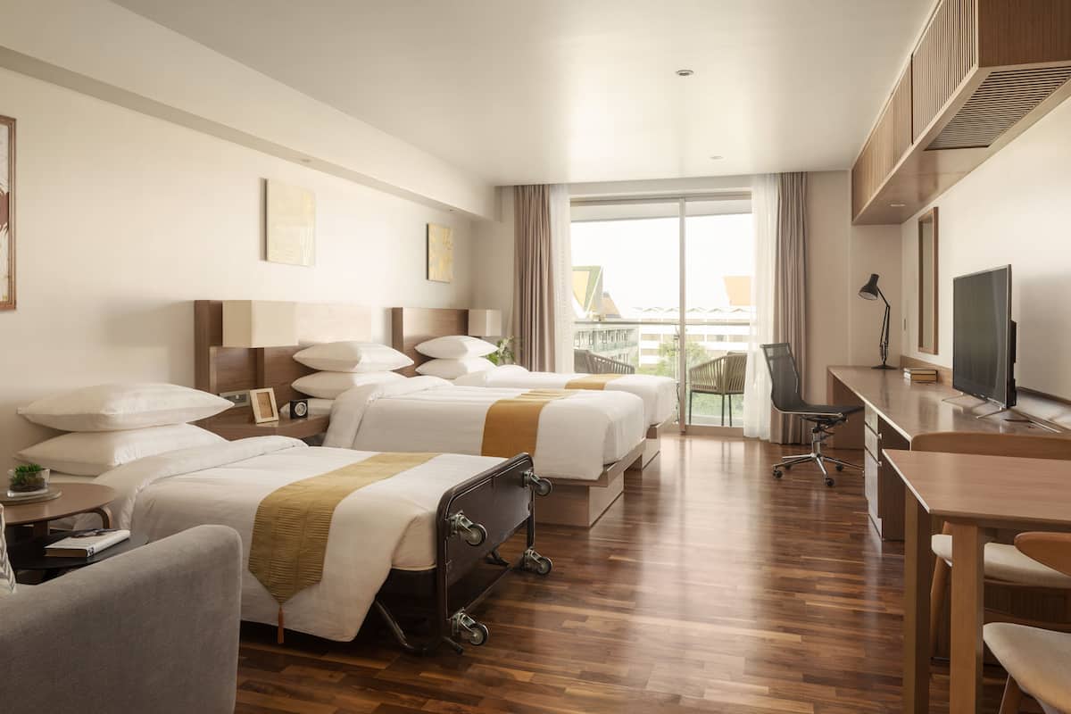 standard triple room | 1 bedroom, in-room safe, desk, blackout curtains