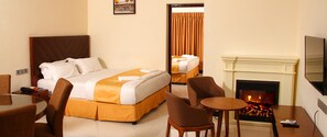 Luxury Suite, 2 Bedrooms, Smoking, Mountain View | Premium bedding, in-room safe, desk, iron/ironing board