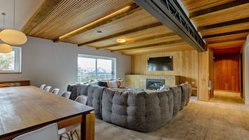 Luxury Penthouse, 4 Bedrooms | Living area | 38-inch flat-screen TV with digital channels, TV, Netflix