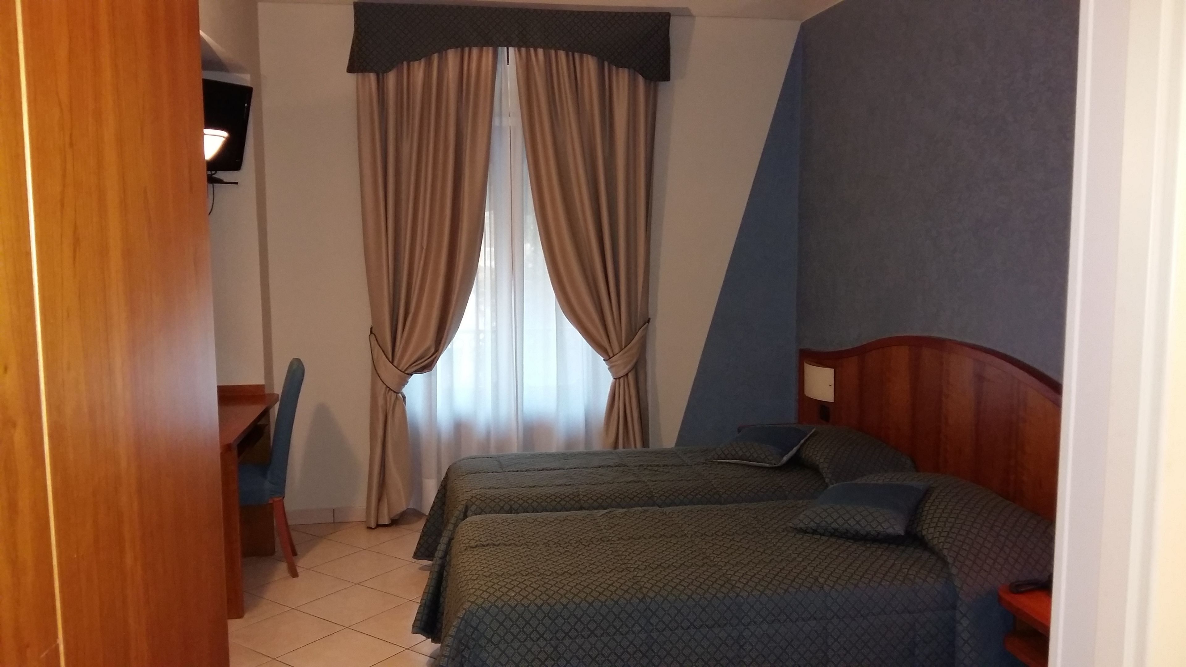 double or twin room | minibar, desk, blackout curtains, free wifi