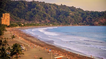 On the beach, sun-loungers, beach towels