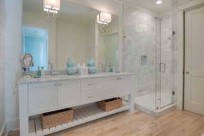 Combined shower/bathtub, hair dryer, towels, soap