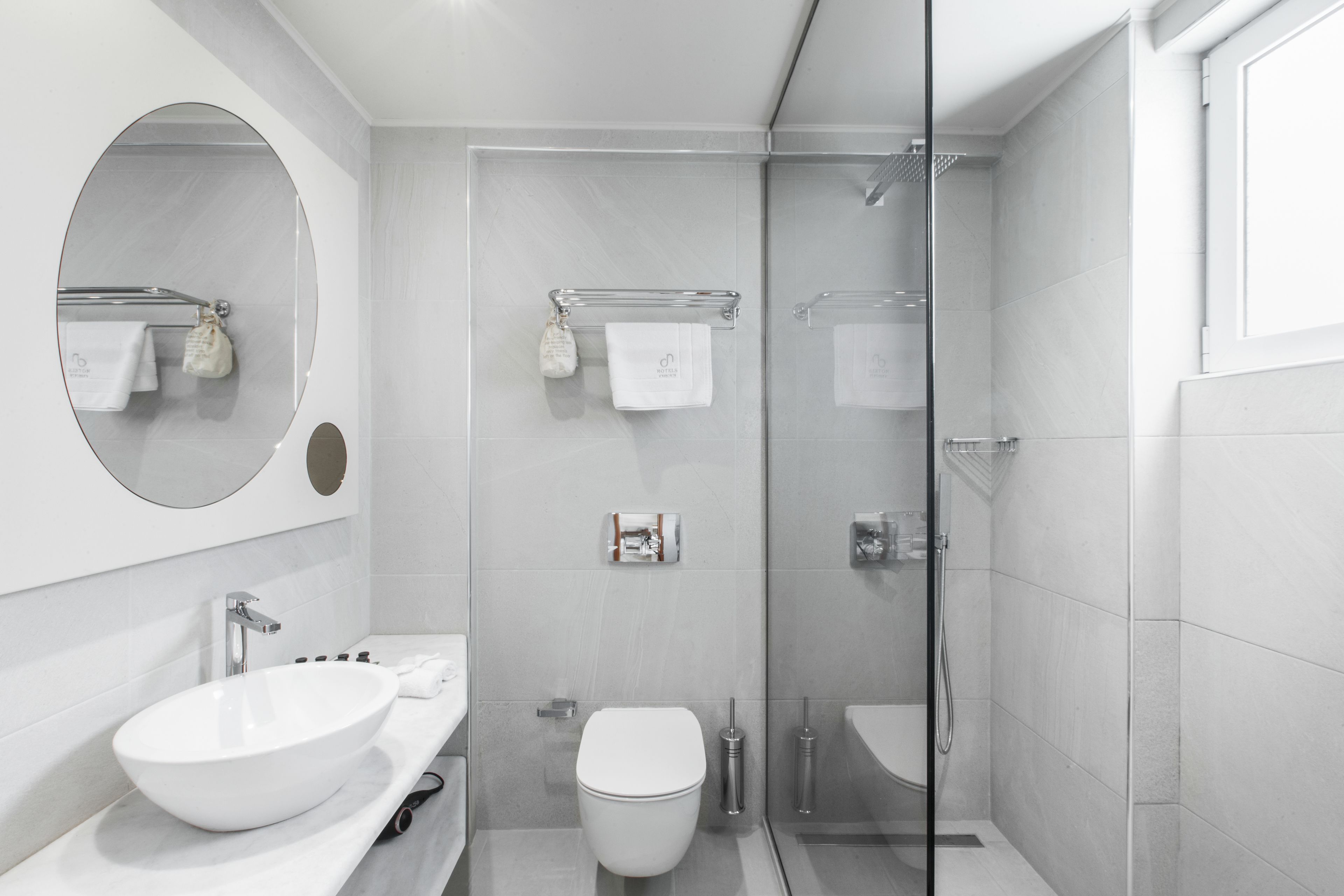 junior suite | bathroom | shower, rainfall showerhead, free toiletries, hair dryer
