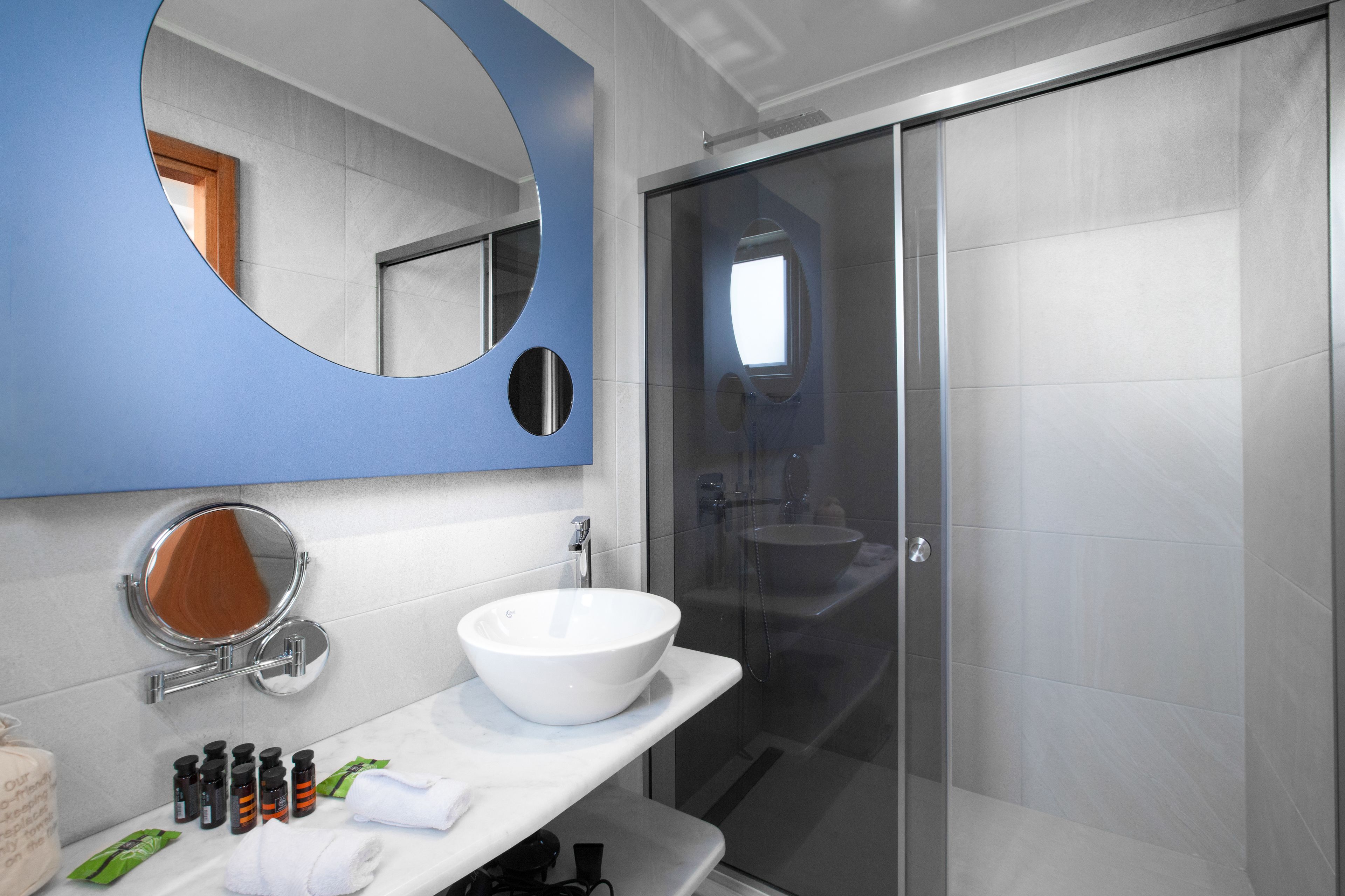 superior suite | bathroom | shower, rainfall showerhead, free toiletries, hair dryer