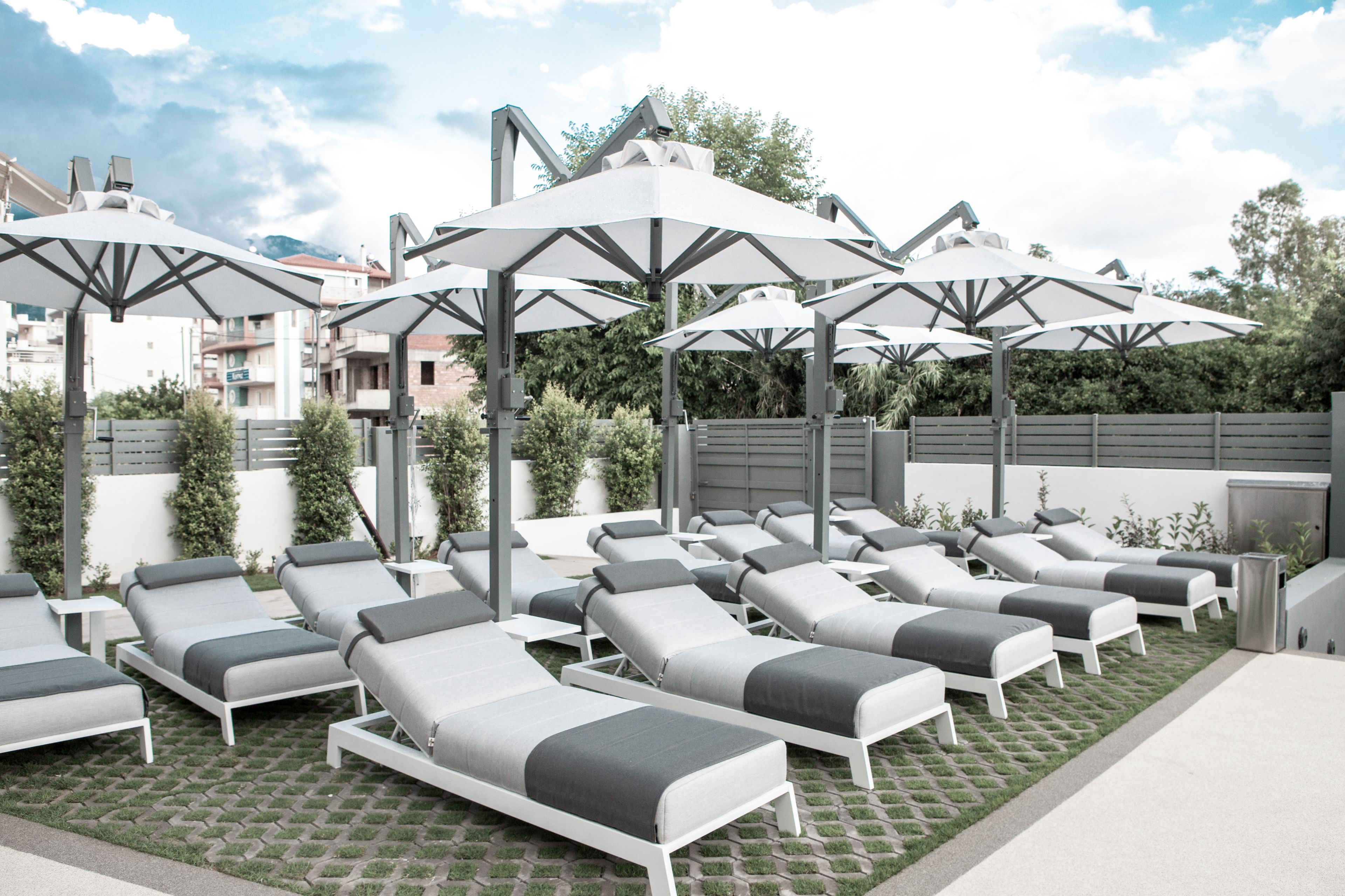 seasonal outdoor pool, pool umbrellas, pool loungers